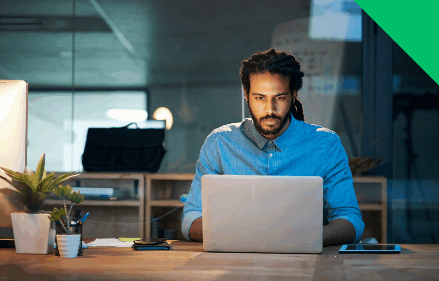 man typing on computer